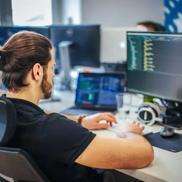 Developer working at computer setup